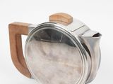 stainless steel coffee pot with wooden handle on white background