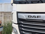 a white truck that is parked on the side of the road