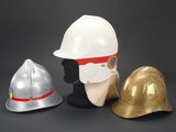 three different types of helmets on display on a black background