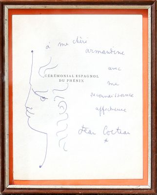 framed drawing of a woman ' s face with writing on it