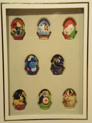 a picture of a picture of a display case with a variety of small figurines in it