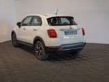 a white car that is parked in a room