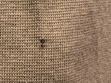 close up of a piece of fabric with a hole in the middle