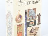 books on a white background with a picture of a vase and other items