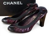 chanel purple patent pumps with black heels and a box