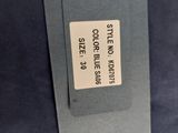 a close up of a label on a black jacket