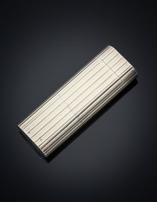 a close up of a lighter on a black surface