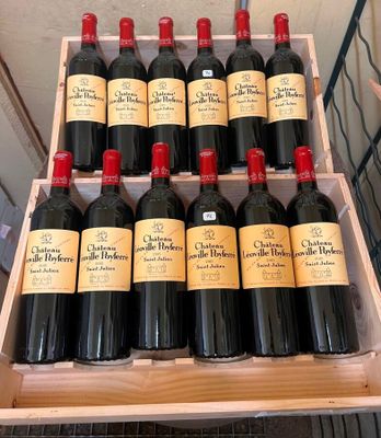 many bottles of red wine in a wooden box