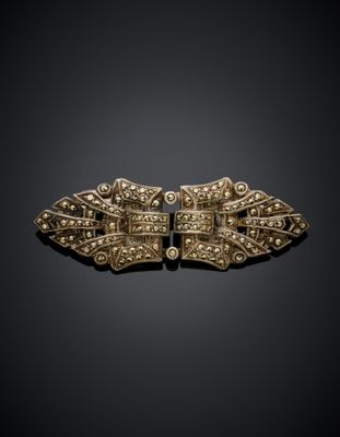 une broche en or et diamants