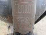 a close up of a motorcycle with a number on it