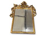 a picture of a mirror with a cross on it