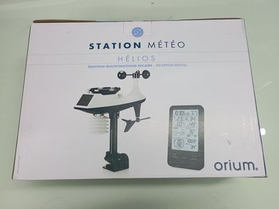 packaging of a digital weather station with thermometer and thermometer on it