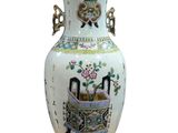 a vase with a picture of a man and a woman on it
