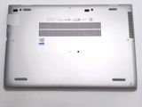 an open laptop computer sitting on top of a white table