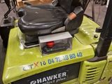 a forklift with a seat on it in a warehouse