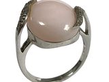 sterling silver ring with a pink stone and pave diamonds