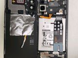 a picture of a cell phone with a broken battery