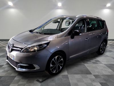 an image of a silver car in a showroom
