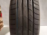 an image of a tire on a white surface