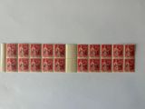 a row of red and white stamps with chinese characters on them