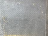un sac en plastique transparent contenant des paillettes dorées