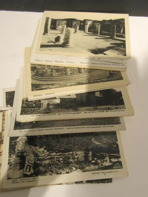 several old black and white photos of a train on a table