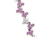 a pair of pink sapphire and diamond earrings