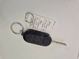an image of a car key and a key chain
