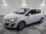 a picture of a white car parked in a garage