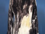 a black and white tie dye jacket on a mannequin mannequin mannequin mannequin mannequin mannequin mannequin manne