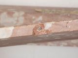a close up of a piece of wood with a hole in it