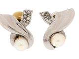 an image of a pair of earrings with pearls and diamonds