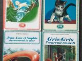 four children ' s books with illustrations of cats, dogs, and other animals