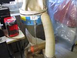an image of a dust collector machine in a room