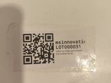 a qr code on the back of a toilet seat