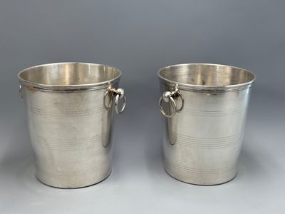 pair of silver plated ice buckets with handles