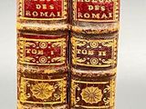 two books sitting on top of each other on a table