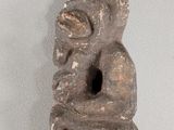an image of a stone statue with a hole in the middle of it