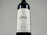 a bottle of wine that is sitting on a table