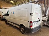 a white van that is parked in a garage