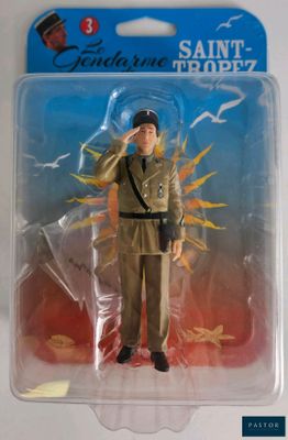 an action figure of a man in a military uniform in a plastic package