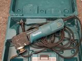 a tool in the case that is sitting on the floor