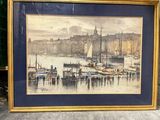 framed picture of a painting of a harbor scene with boats in the water