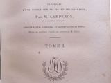 an old book with a black and white title on it