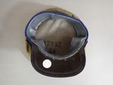 a brown hat with a blue band on top of it