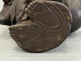 a chocolate sculpture of a woman with a crown on her head
