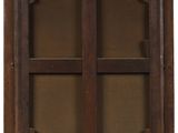 an old wooden window with a glass pane in it