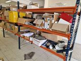 many boxes and boxes on the shelves in the room