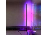 a glass shower with a purple light in the shower