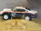 a toy car that is on display in a glass case